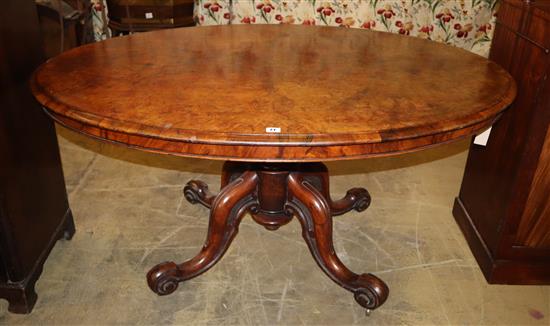 A Victorian figured walnut oval breakfast table, 144 x 107cm